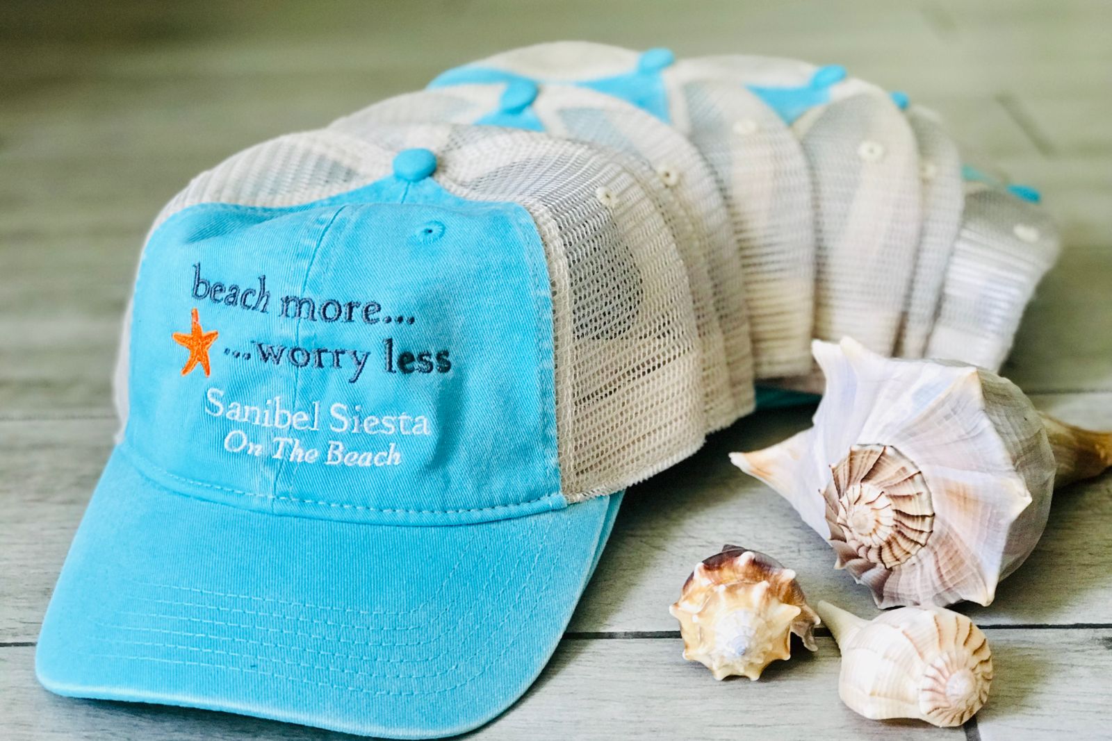 matching hats at sanibel siesta on the beach